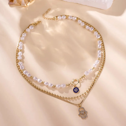 Collar Ojo Turco y Mano de Fátima - Protección y Buena Energía